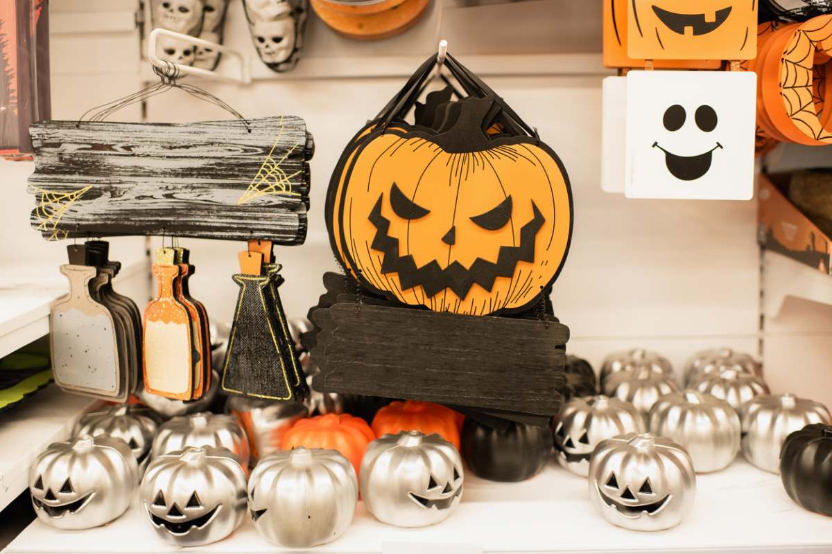 Halloween decor sitting on a table ready to be packed away for next year.