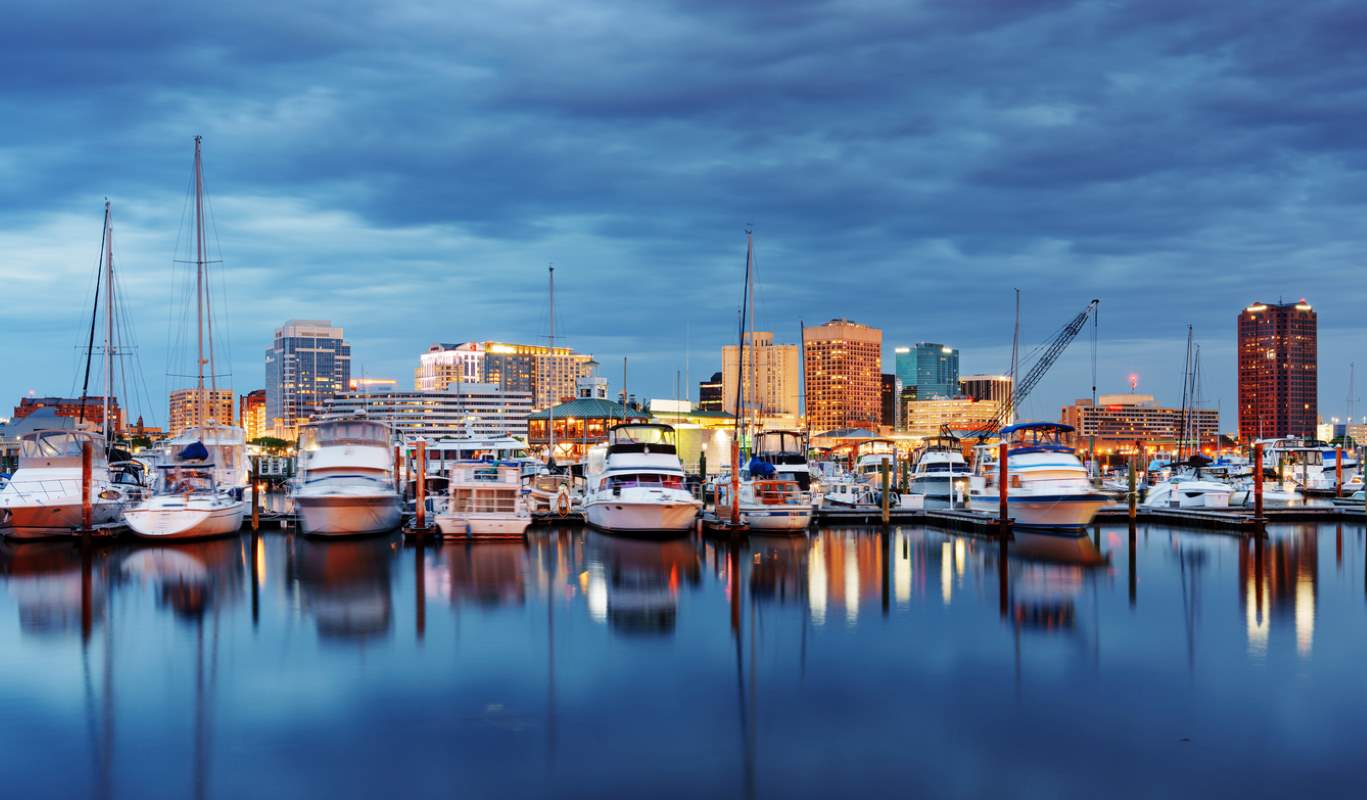 Boats at twilight docked on Chesapeake Bay in Norfolk, VA.