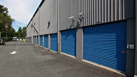 Storage units next to the gated entrance of Self Storage Plus - Bel Air.