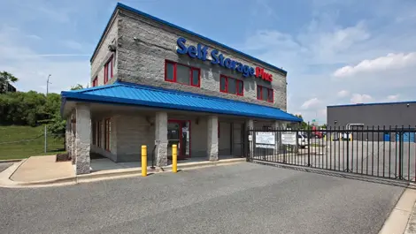 The gated entrance to Self Storage Plus - Canton.