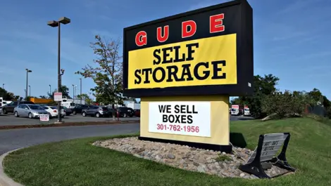 Gude self storage sign.