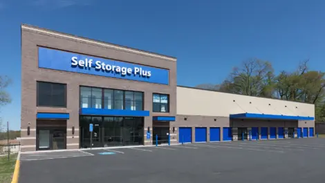 Self Storage Plus building during the day.