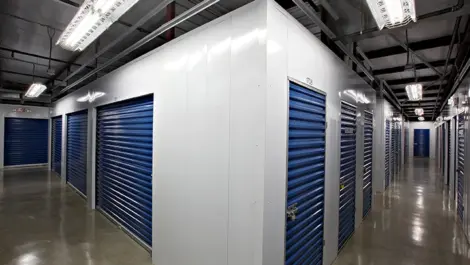 Inside view of storage units with blue doors.