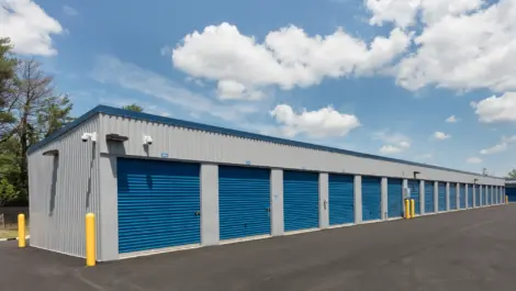 Row of blue and gray storage units.