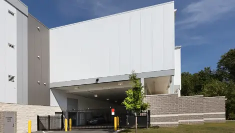 Overhead gates storage unit access.