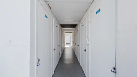 Hallway of personal indoor storage units.