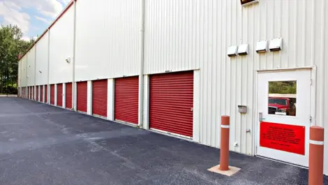 Storage units with red doors.