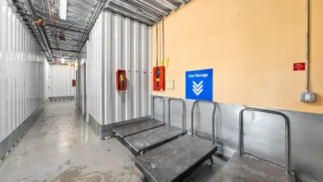 Inside view of storage facility with four push carts.