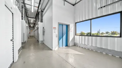 Inside of storage facility showing the second floor view near elevator.