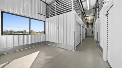 Inside view with a window of facilities indoor storage units.