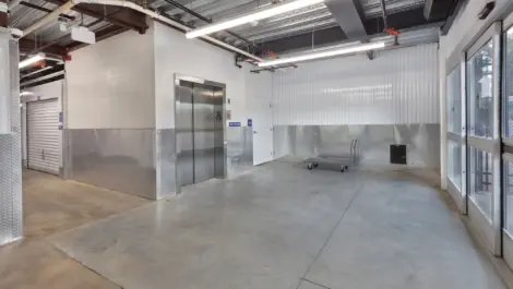 Lanham Self Storage indoor loading area with elevator.