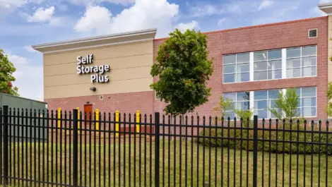 Self Storage Plus Southern ave exterior photo of building surrounded by fence.