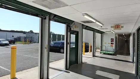 Indoor storage with large opening doors to the outside.