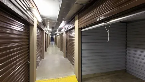 Westlake Self Storage medium indoor storage unit with door opened.